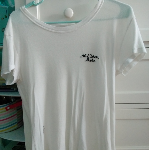 Brandy Melville Tops - White brandy melville "not your babe"